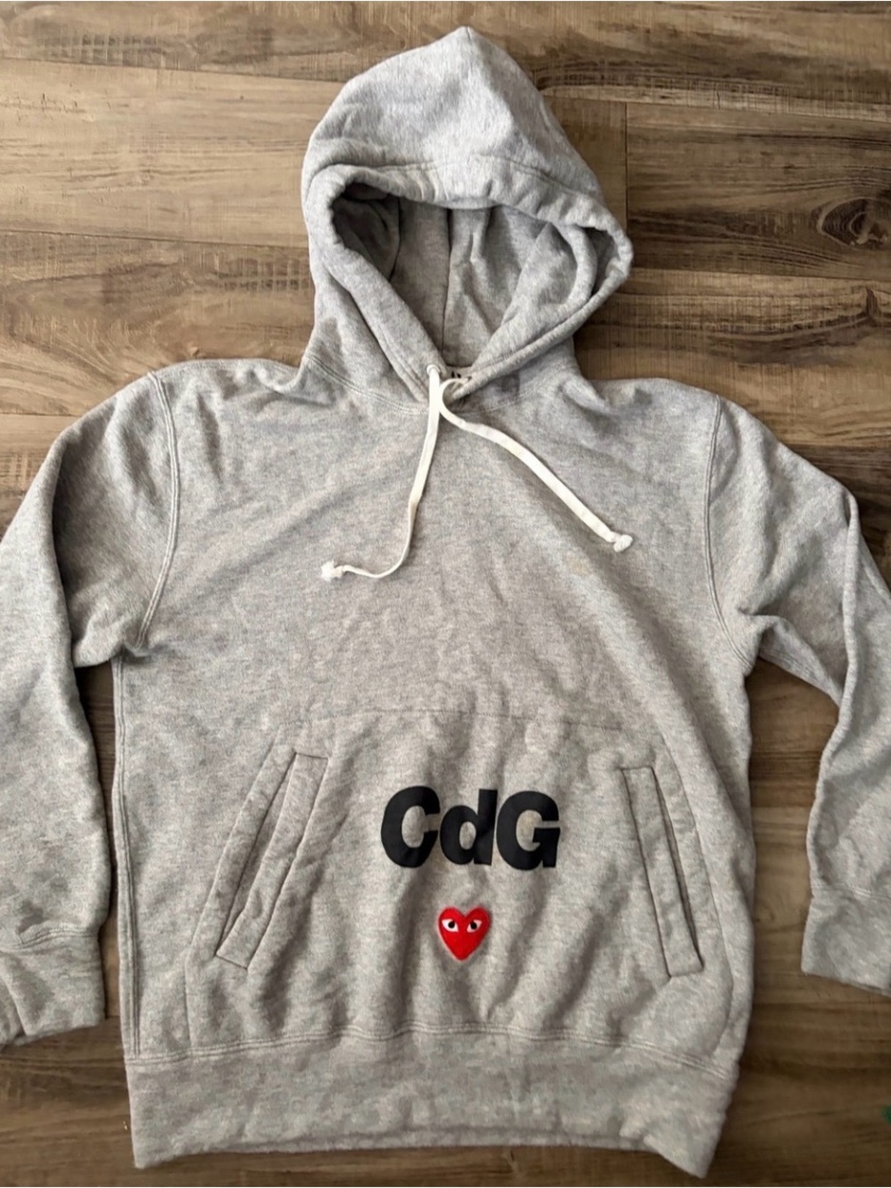 Comme des Garcons Light Gray Hoodie with Red Heart and Black CdG Logo